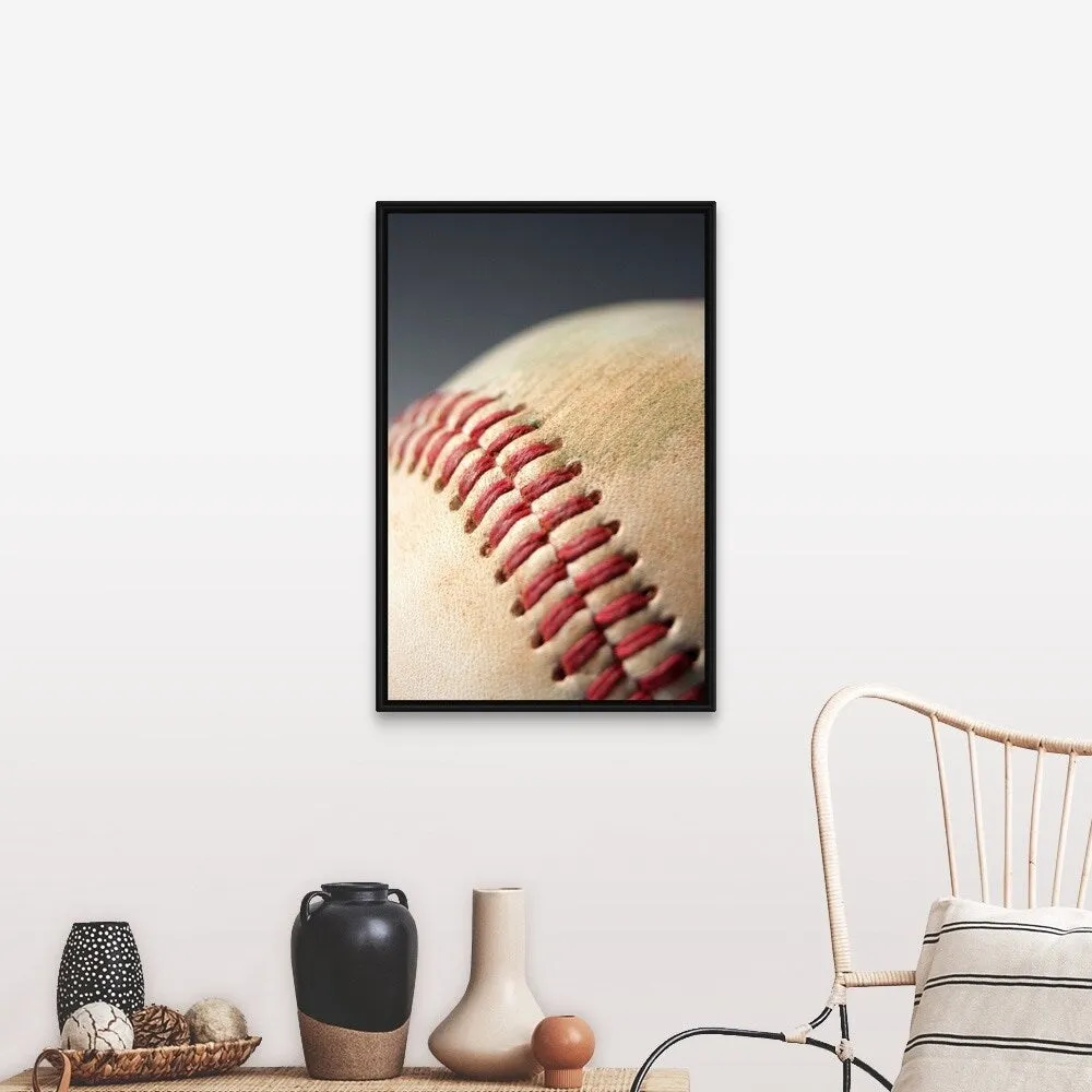 "Baseball with impact mark." Black Float Frame Canvas Art
